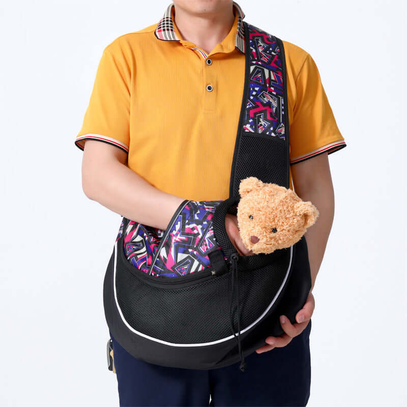 Carrying Pets Bag Women Outdoor Portable Crossbody Bag For Dogs Cats Pet Products being held by a person with a stuffed animal.